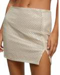 Silver sequin skirt worn by a women on a white background