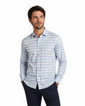 Man wearing a light blue checkered shirt on a white background