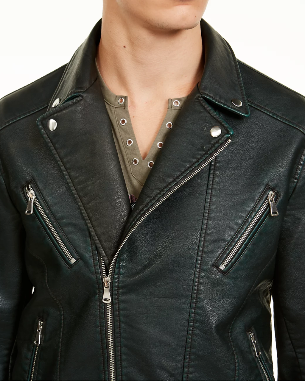 Close-up of a black leather jacket with silver zippers 