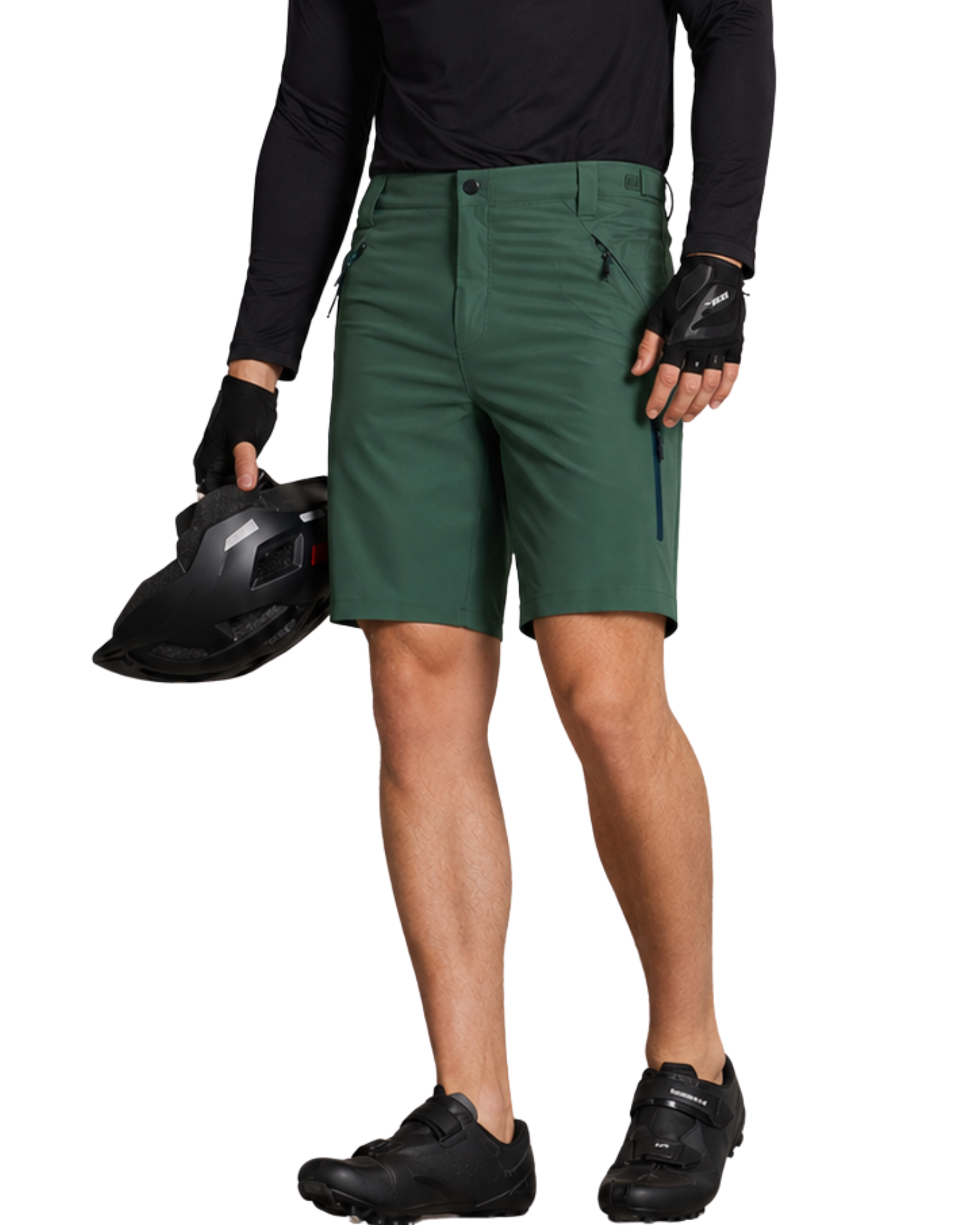 Person wearing green shorts holding a helmet on a white background