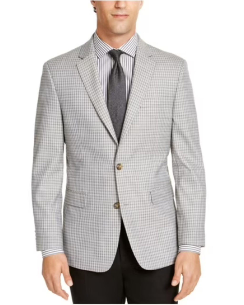 Man wearing a checkered blazer over a striped shirt with a tie on a white background