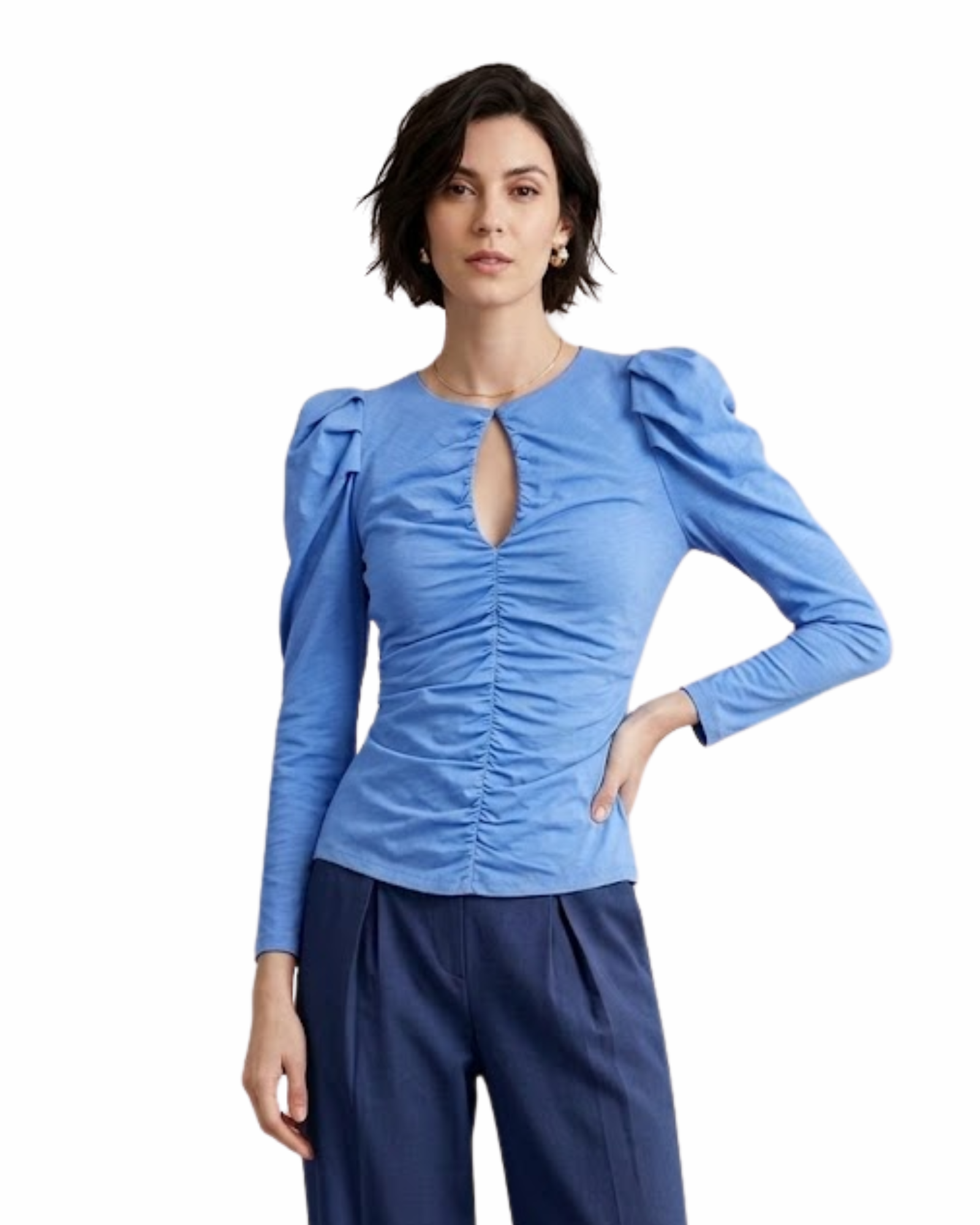 Woman wearing a blue blouse with ruched design and long sleeves on a white background
