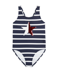 Navy and white striped swimsuit with a red sequin star on a white background