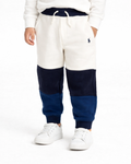Color-blocked sweatpants with a logo on a white background