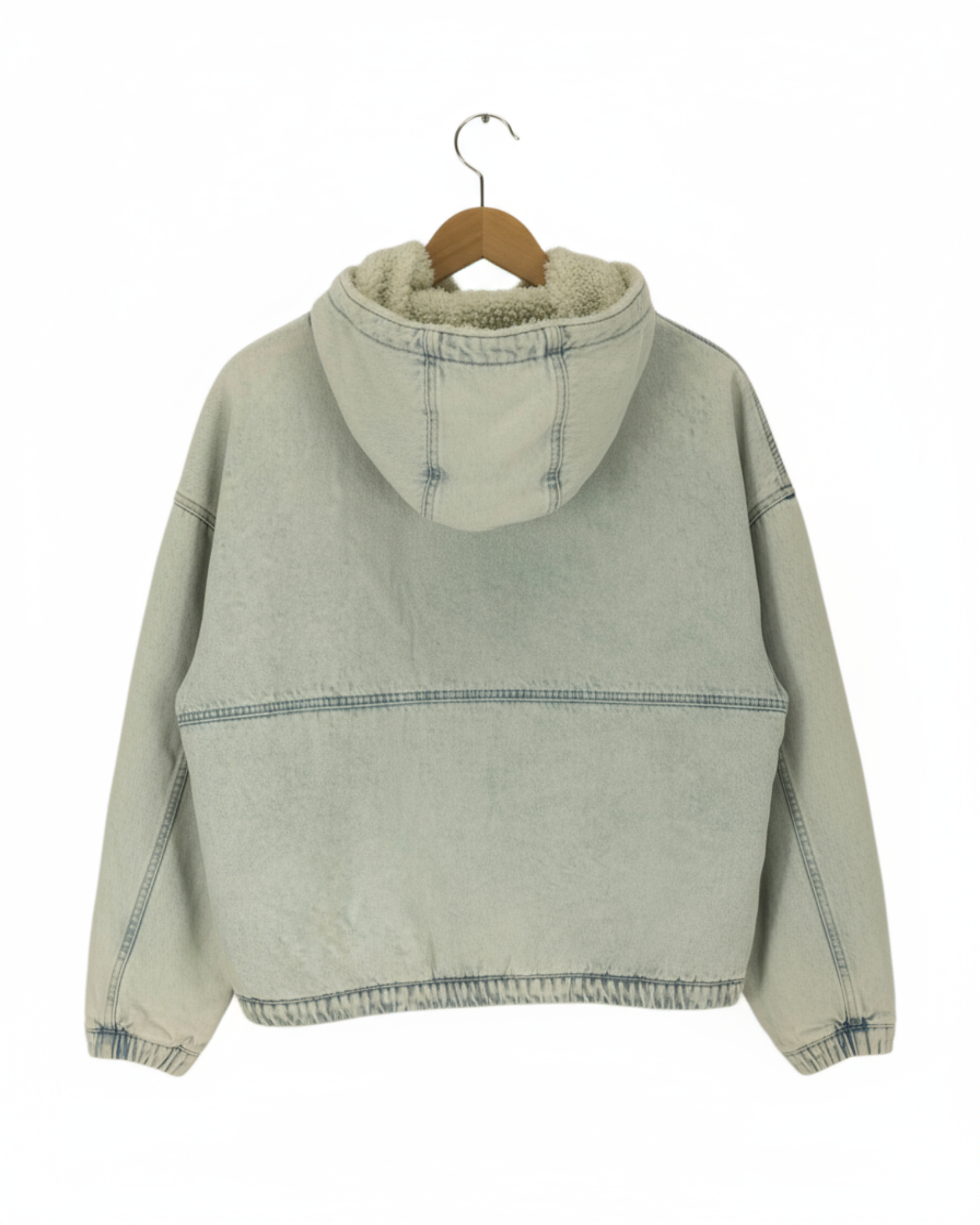 Light blue hooded jacket on a wooden hanger against a white background