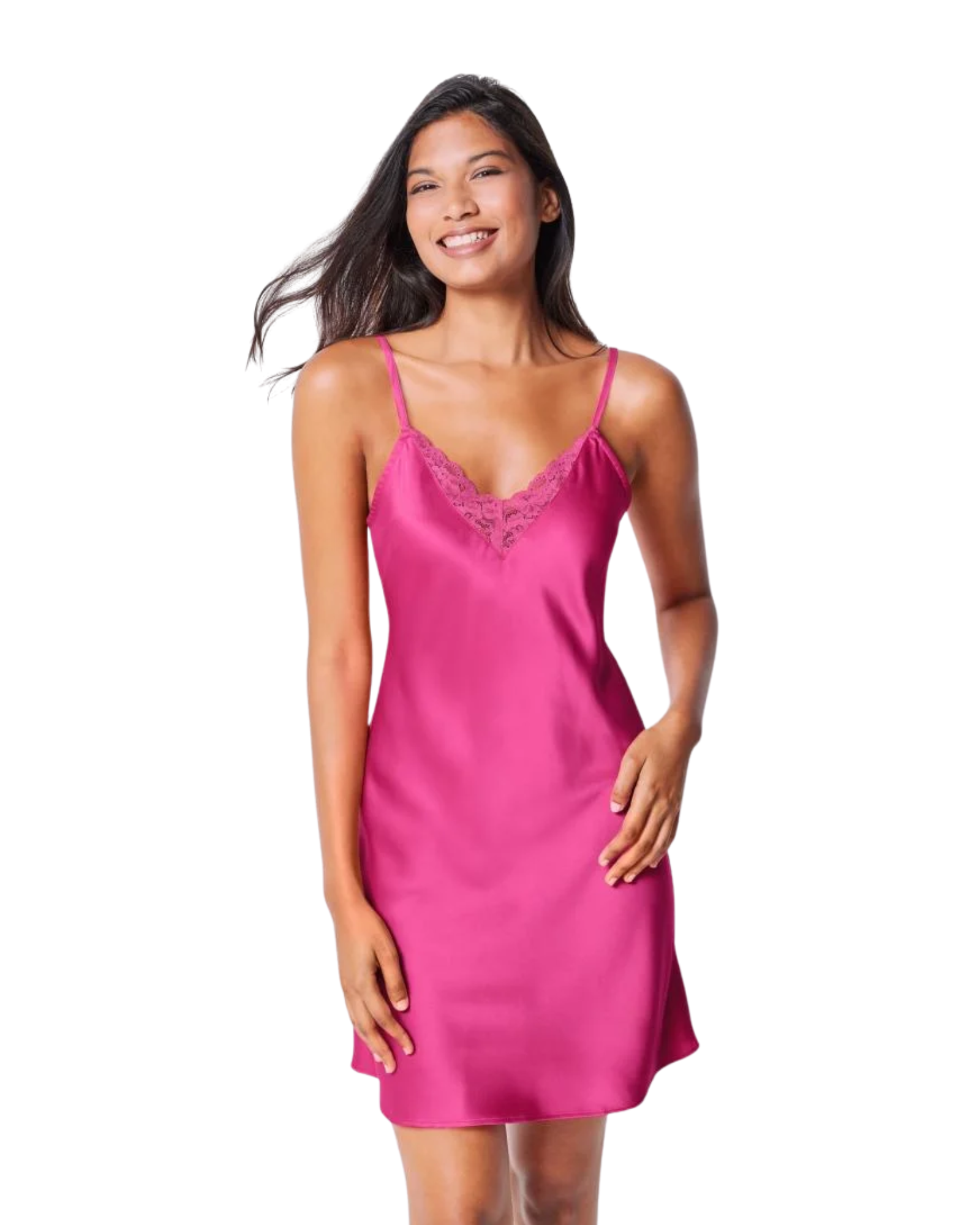 Woman wearing a pink slip dress on a white background