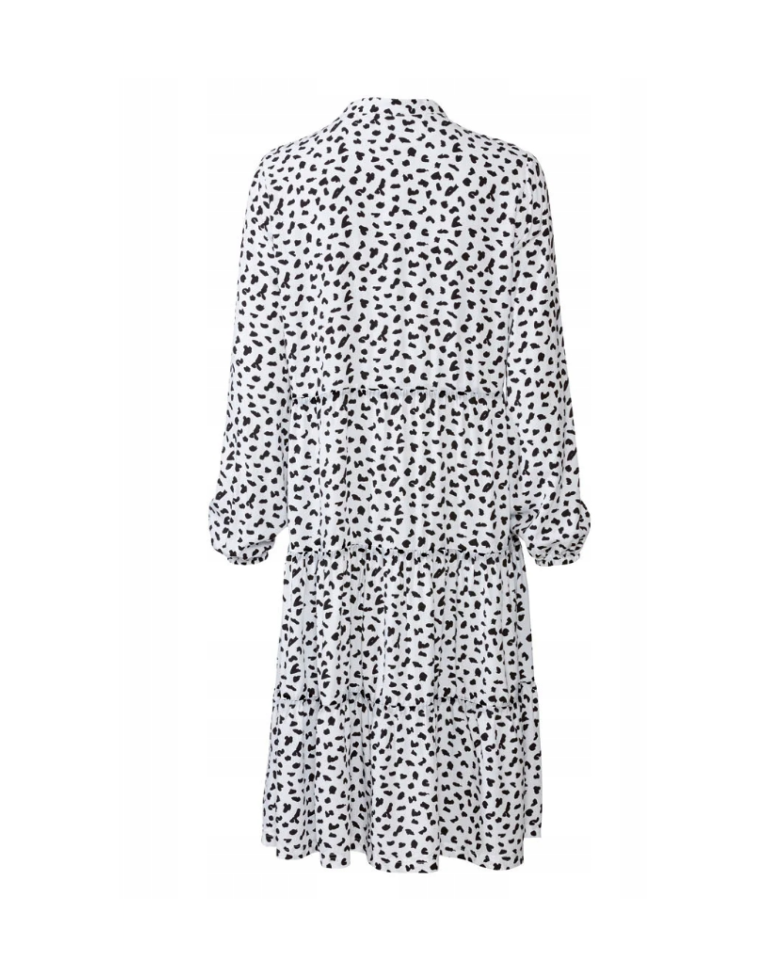 Black and white polka dot dress on a white background