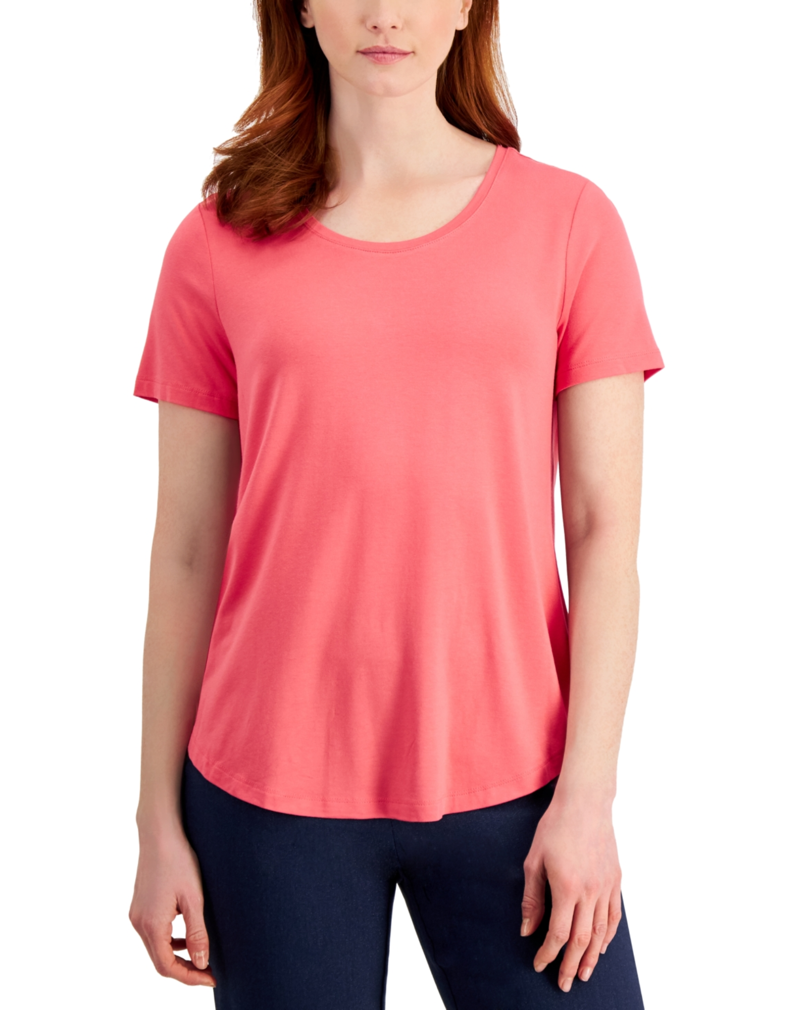 Woman wearing a coral t-shirt on a white background