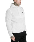 Man wearing a white hoodie with a small black logo on a white background