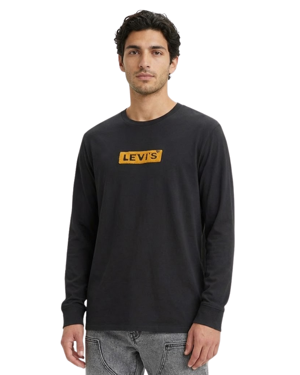 Man wearing a black Levi's long-sleeve shirt on a white background