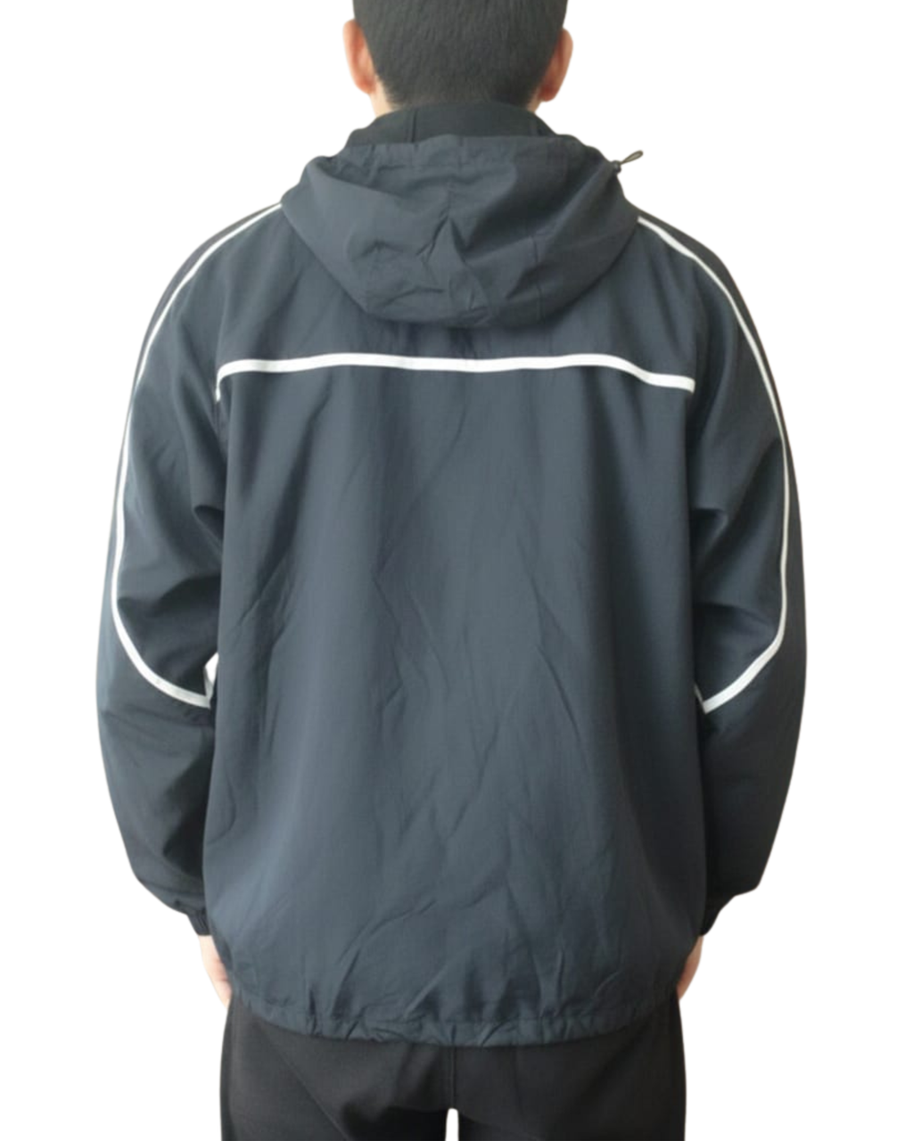 Person wearing a dark gray raincoat with white stripes 