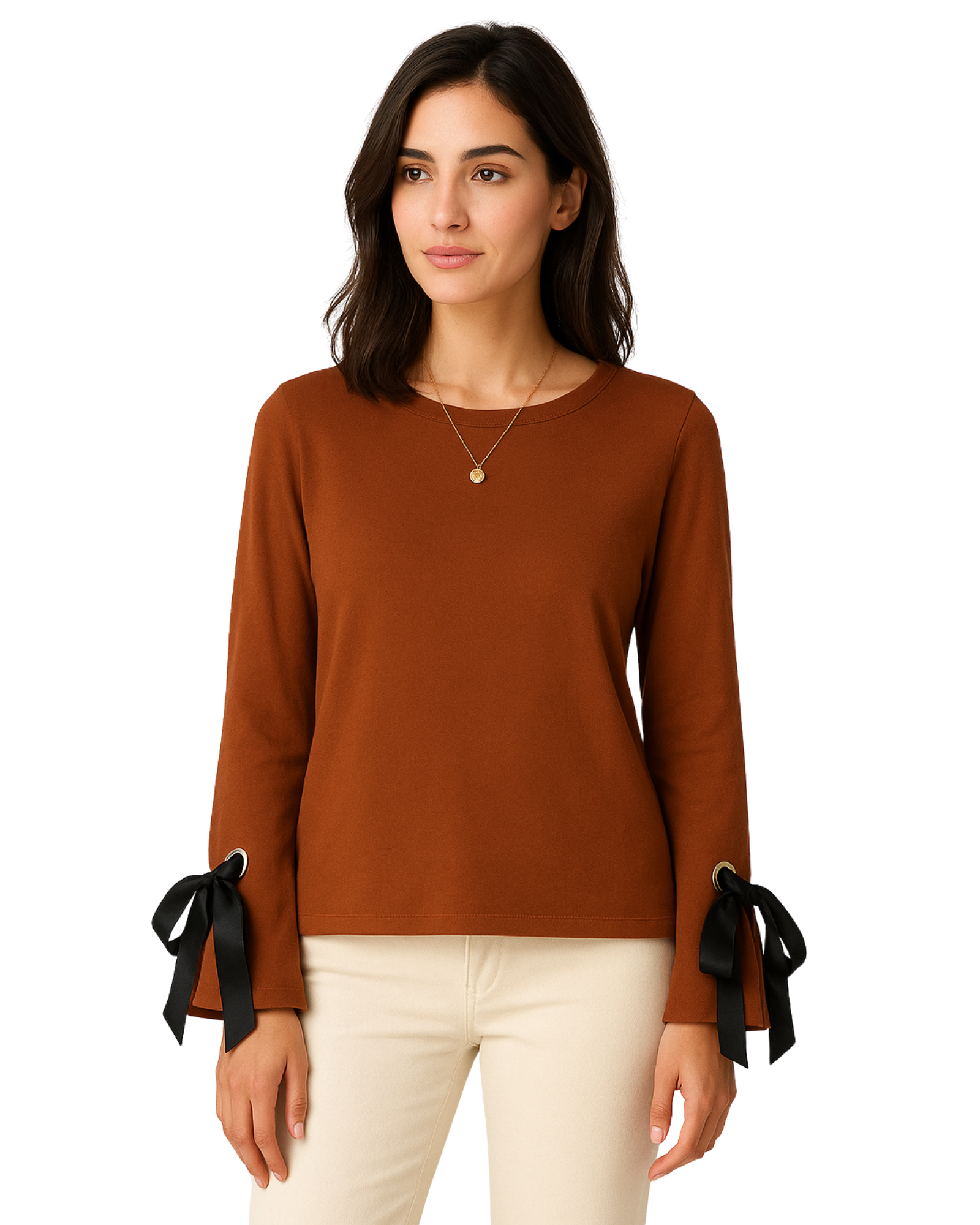Woman wearing a brown long-sleeve top with black bow details 