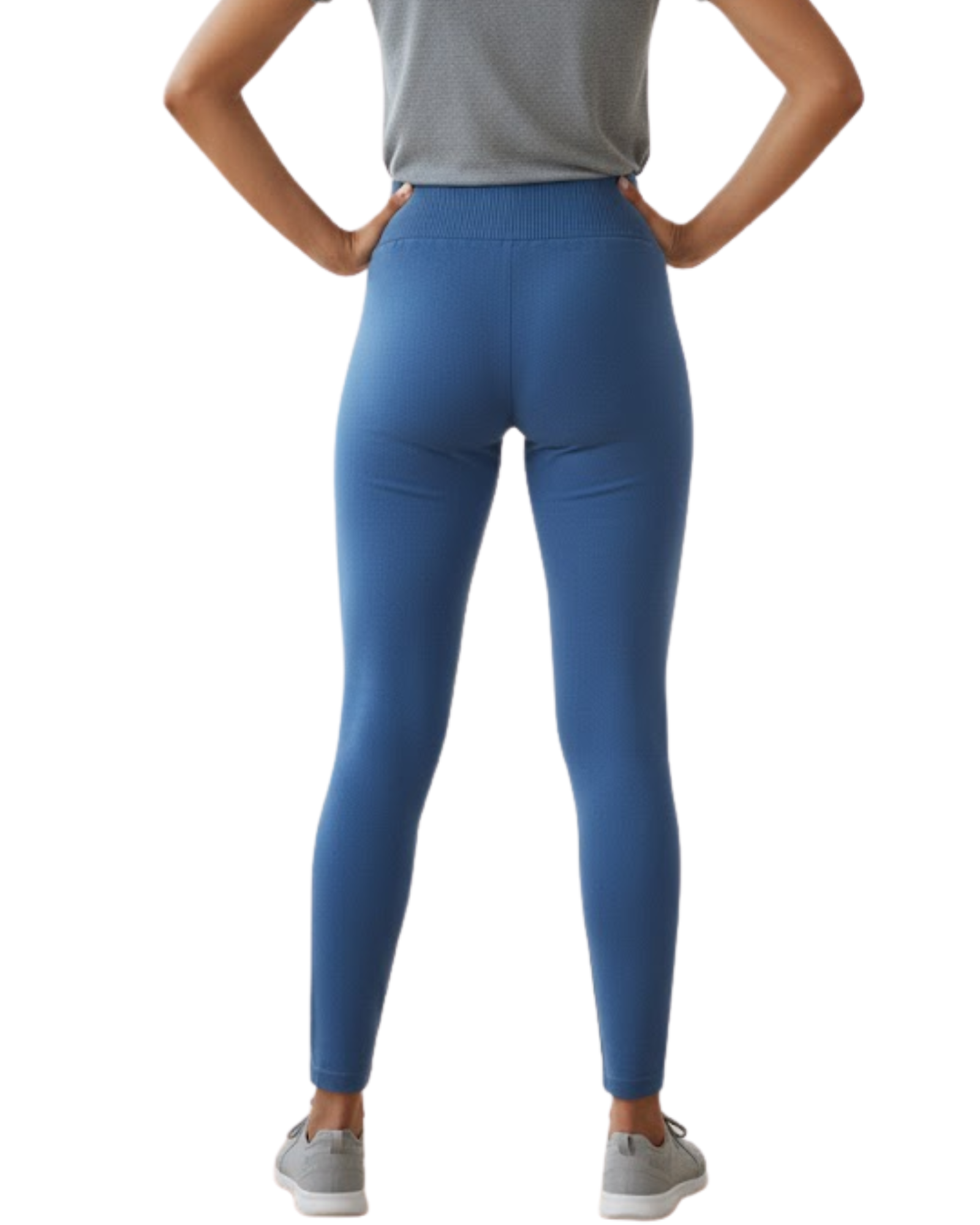 Person wearing blue leggings and a gray top 