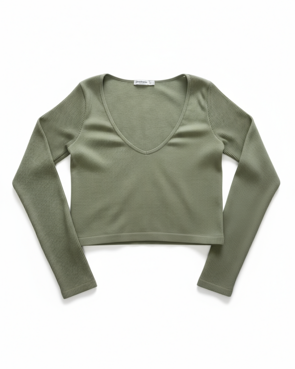 Green long-sleeve crop top on a white background